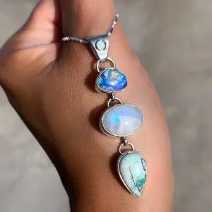 Cascading opal, moonstone, opalized petrified wood & tourmaline necklace in silver