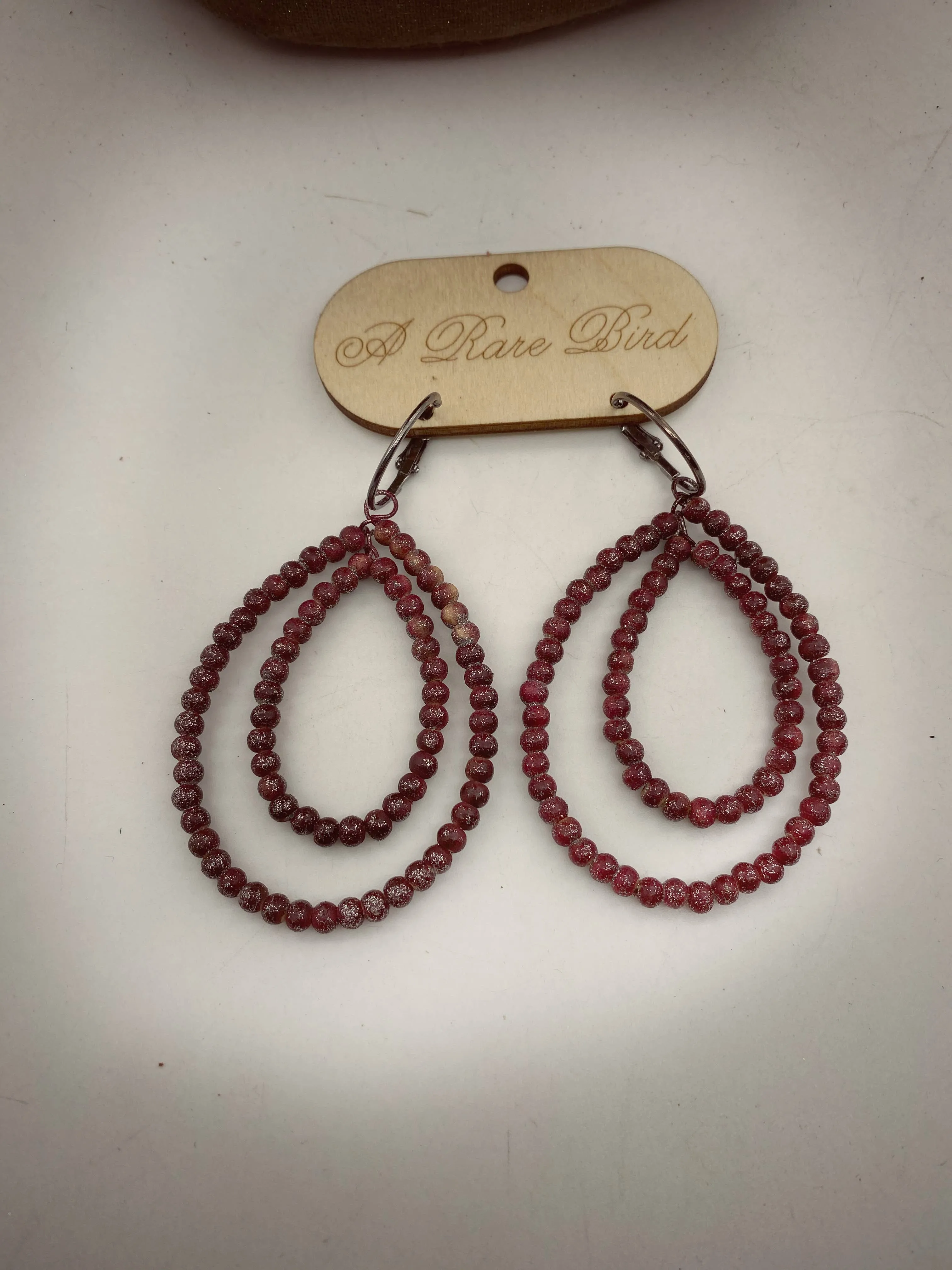 Cranberry Teakwood Rare Bird Necklace