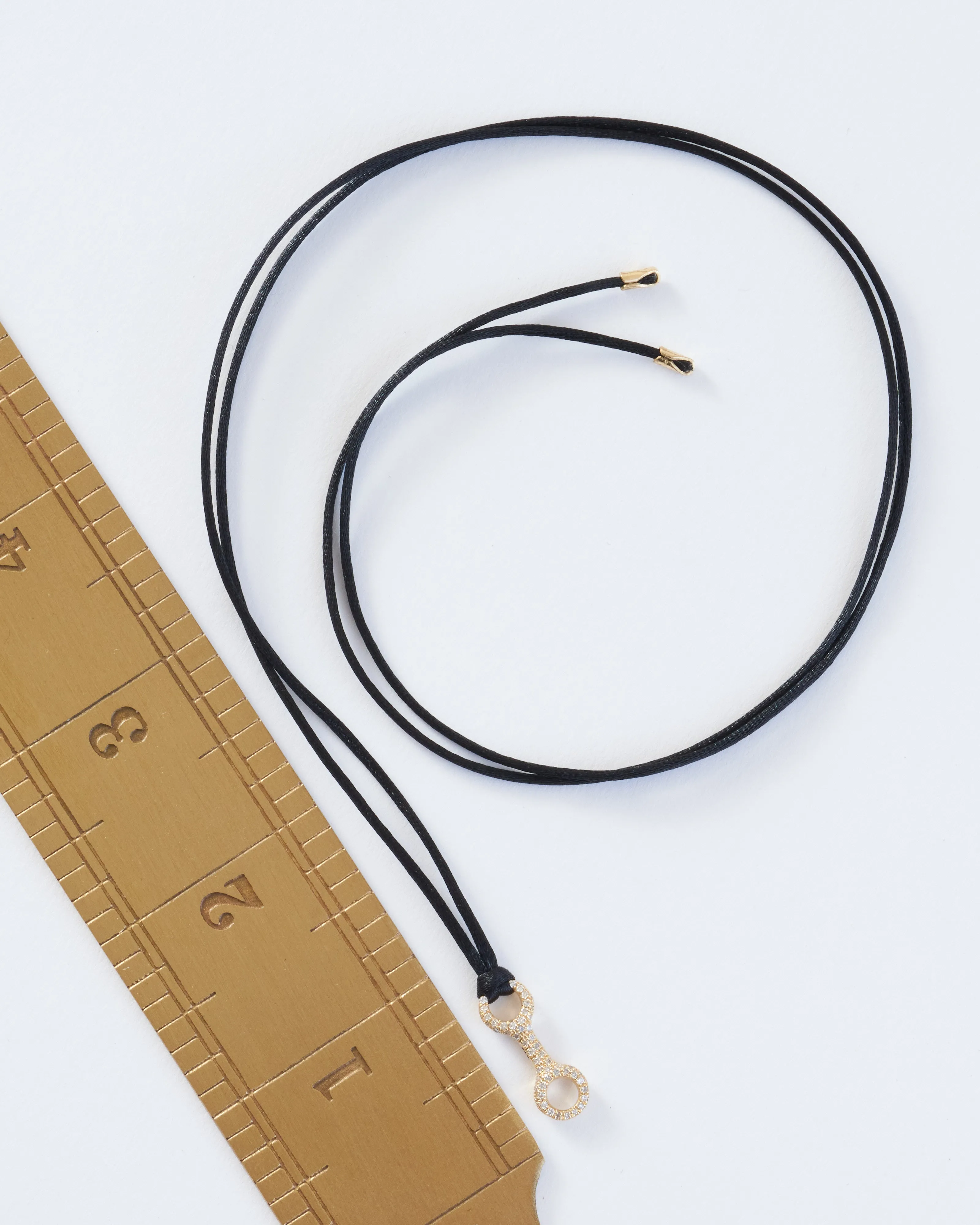 medium double beam link with white pavé diamonds on silky cord necklace