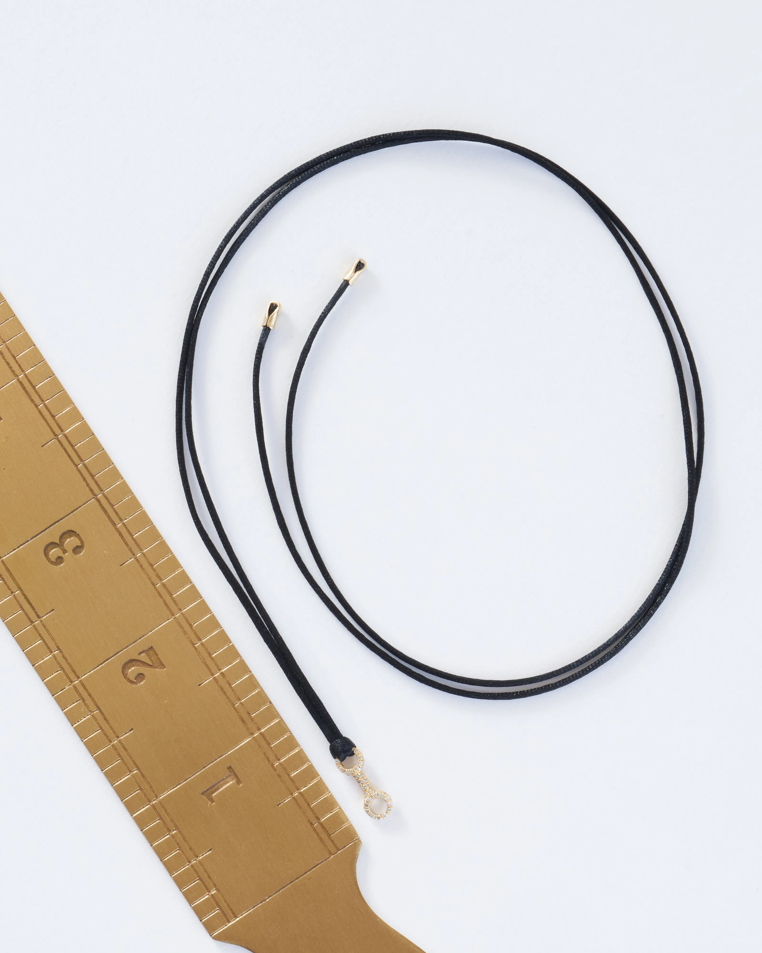 mini double beam link with white pavé diamonds on silky cord necklace