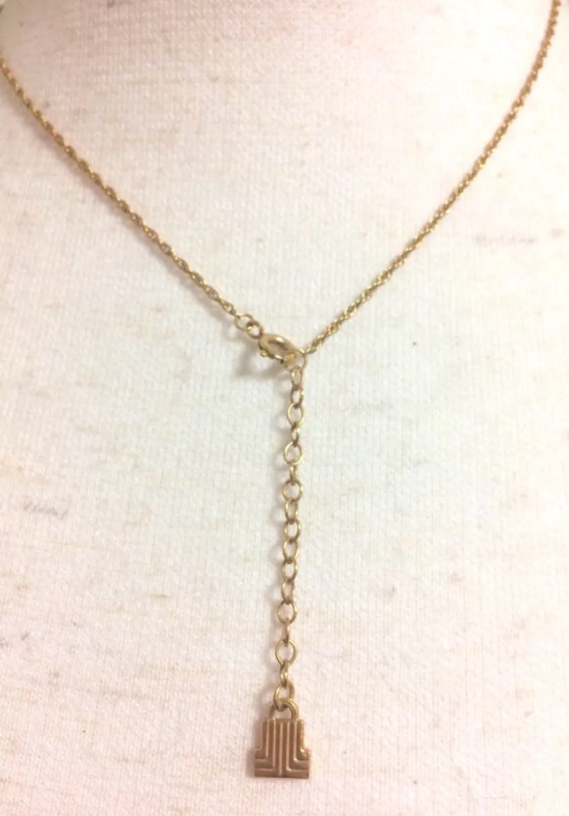 Vintage LANVIN golden skinny chain necklace with heart logo charm pendant top with clear crystals and blue crystal. 05063010