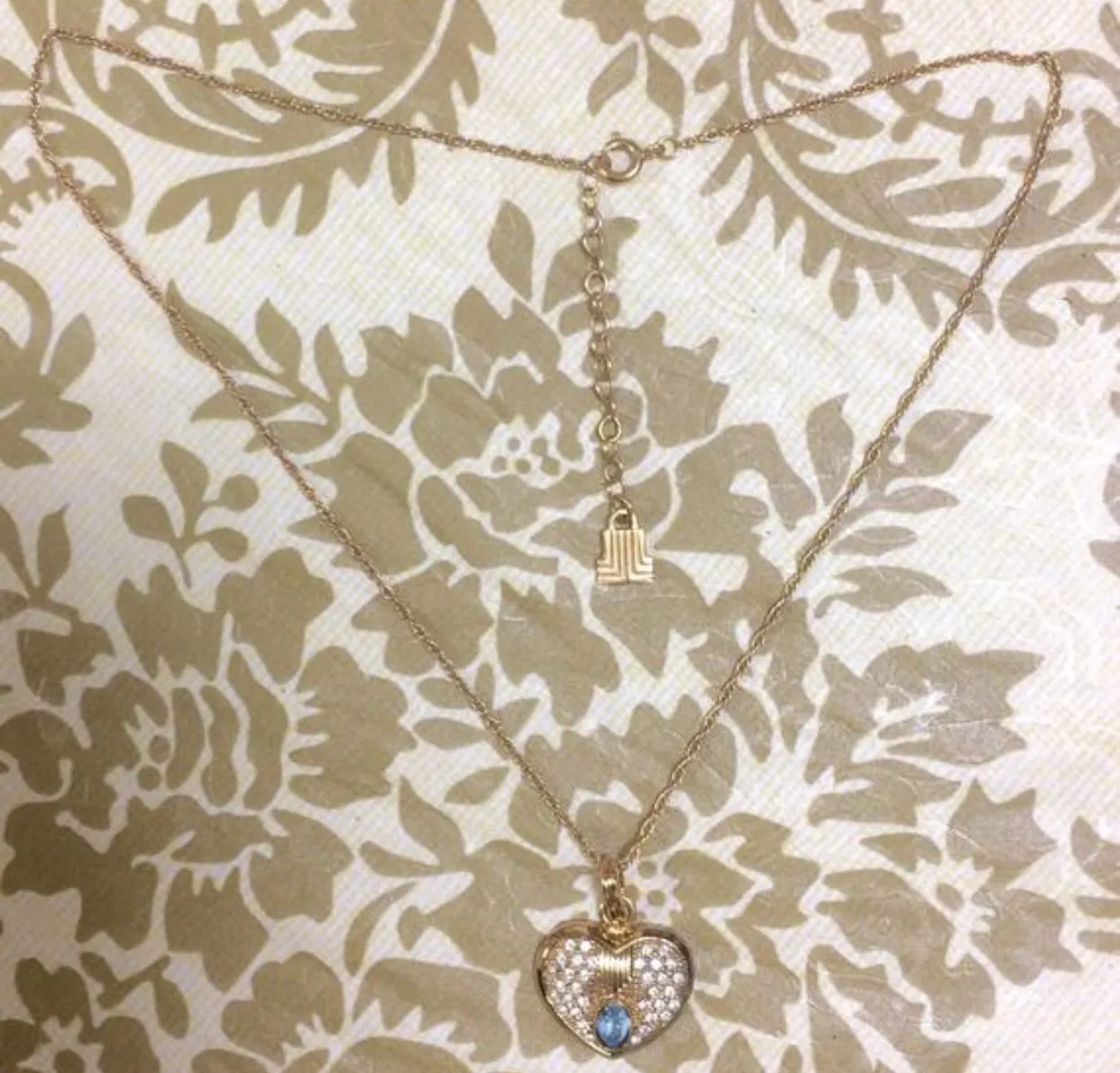 Vintage LANVIN golden skinny chain necklace with heart logo charm pendant top with clear crystals and blue crystal. 05063010